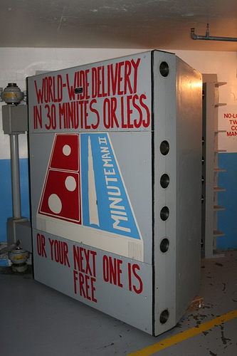 The blast door to a launch control facility at a decommissioned Minuteman II missile site (now a historical site) in South Dakota advertising the U.S. ability to deliver its nuclear missiles around the globe in half an hour. (Source:  